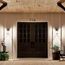Atwood 11" 1 Light Outdoor Wall Light w/ Light Umber Mist Glass and Brown Stone