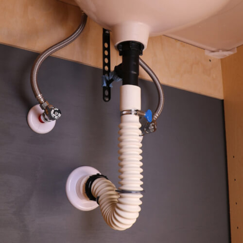 Main product image of 1-1/4" to 1-1/2" Flexible Rubber Hose P-Trap w/ Threaded Adapter
